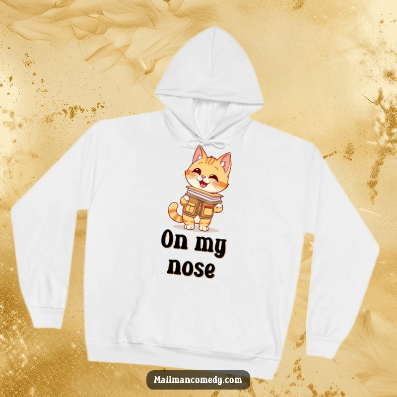 Funny hoodie featuring a giggling cat in a mail carrier vest, balancing a stack of letters on its nose, cozy and cute.